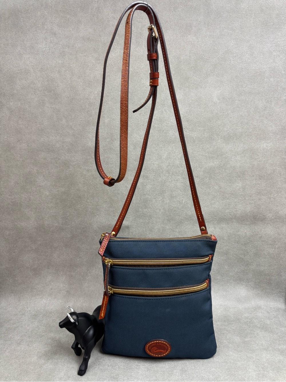 Dooney & Bourke Navy Crossbody with Brown Leather Strap